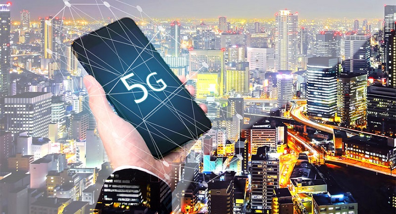 5G network wireless systems digital hologram and internet of things on city background.